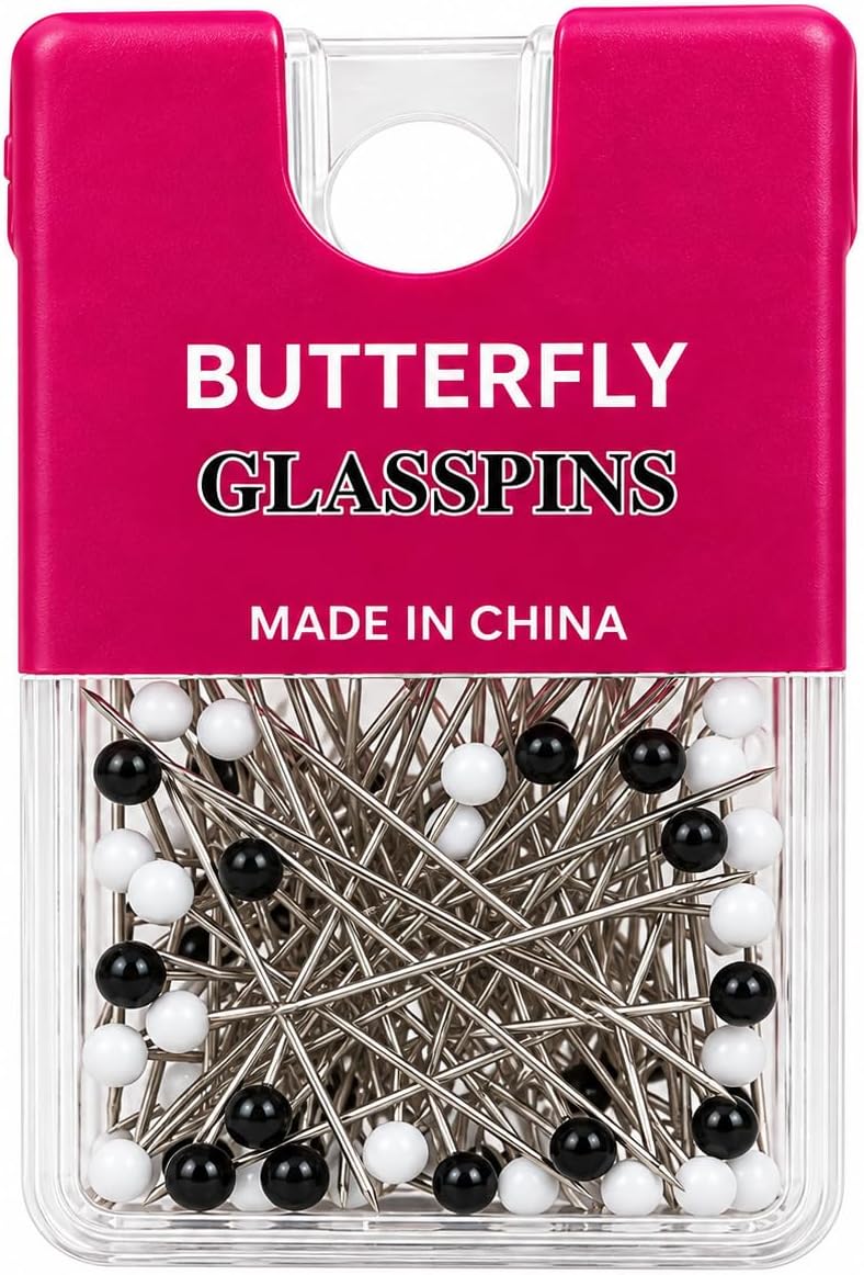 A box of 80 black and white glass head pins with a transparent case